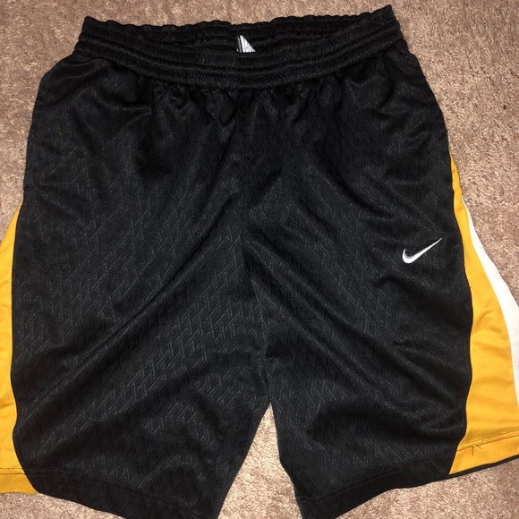 black and yellow nike basketball shorts